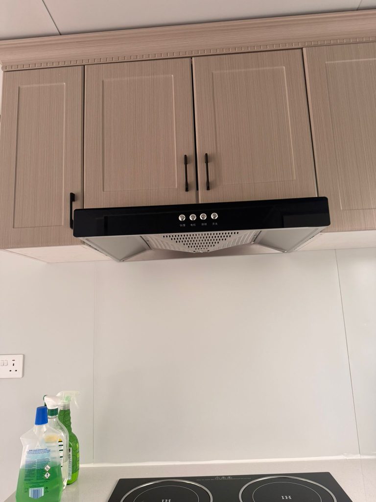 Modern modular home kitchen cabinets and extractor setup in a turnkey home in Limerick